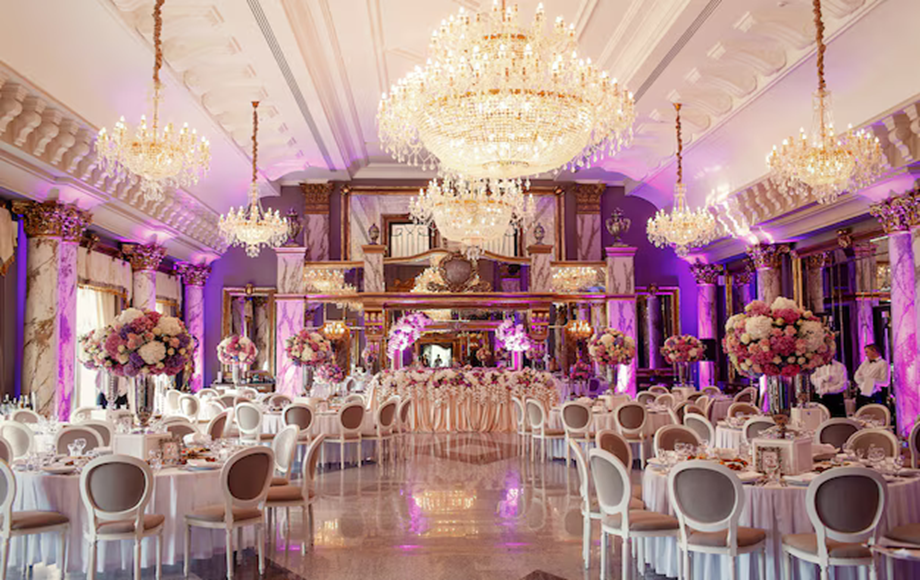 luxurious-dinner-hall-with-large-crystal-chandelier_8353-565